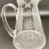 Glass and carafe set with chiseled flower motif