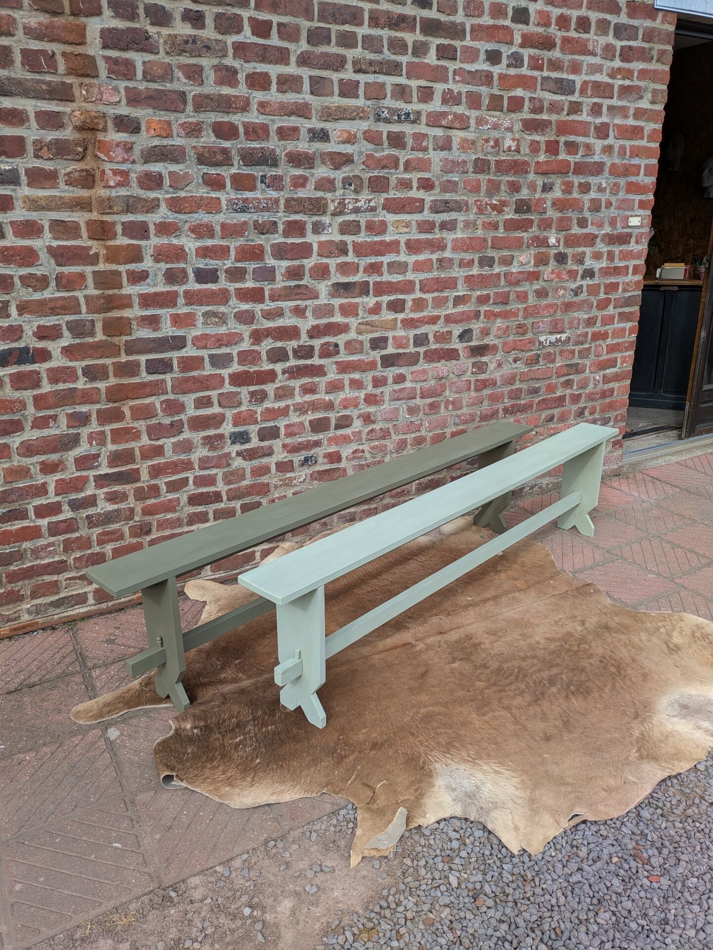 Pair of patinated benches