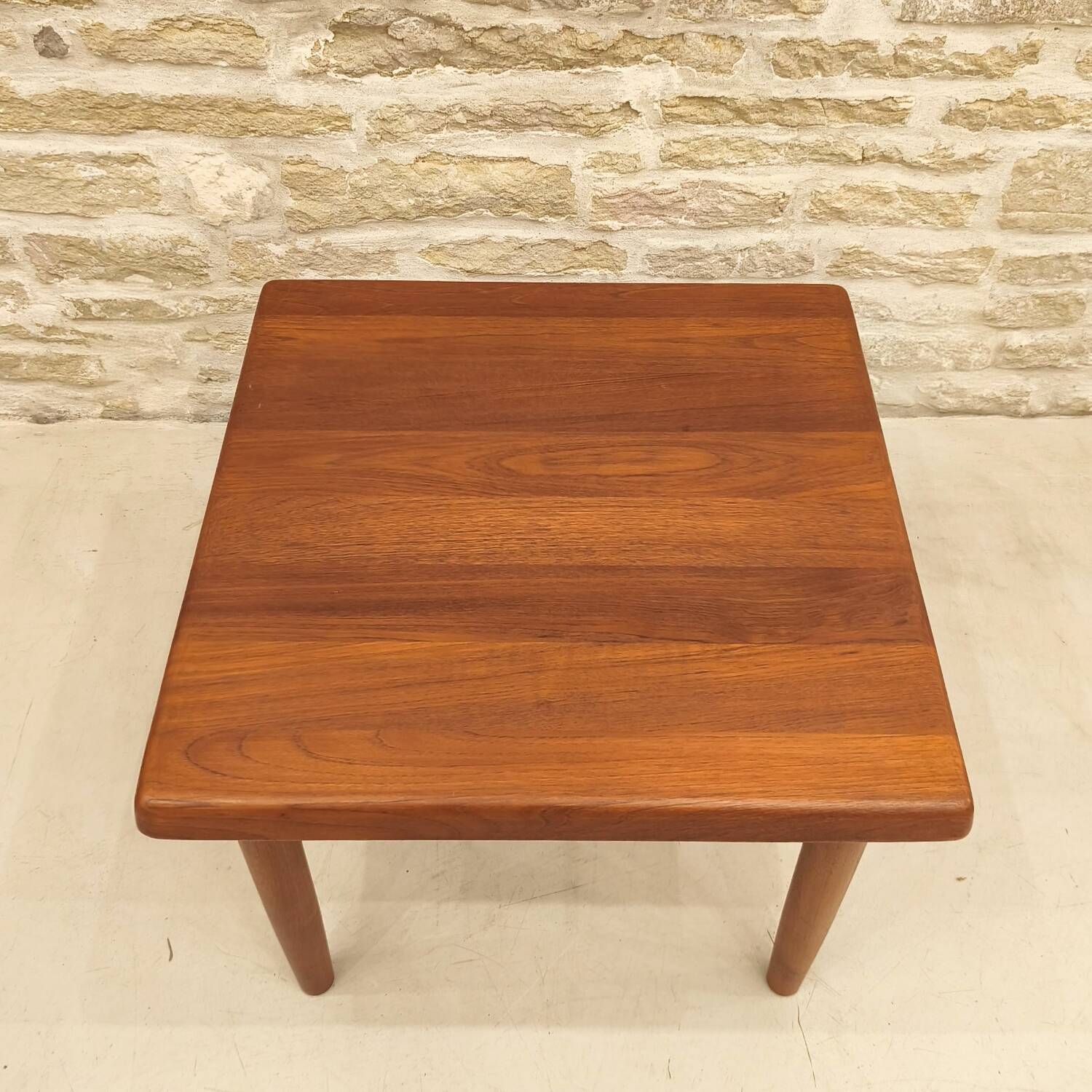 Teak coffee table designed by Niels Bach, Danish production.