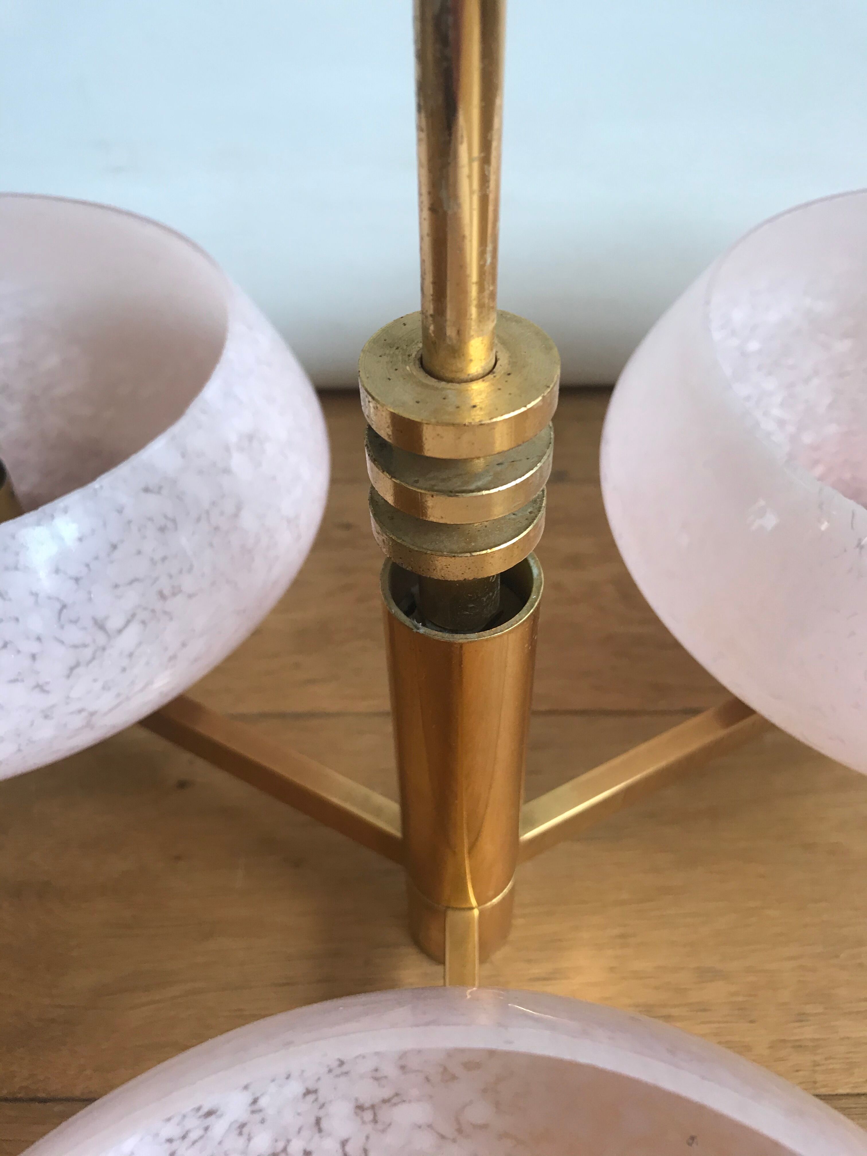 Golden chandelier by Maison Sciolari