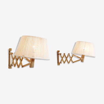 Pair of pine accordion sconces with cotton rope lampshade.