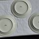 Set of 6 vintage Limoges porcelain plates with fish design.