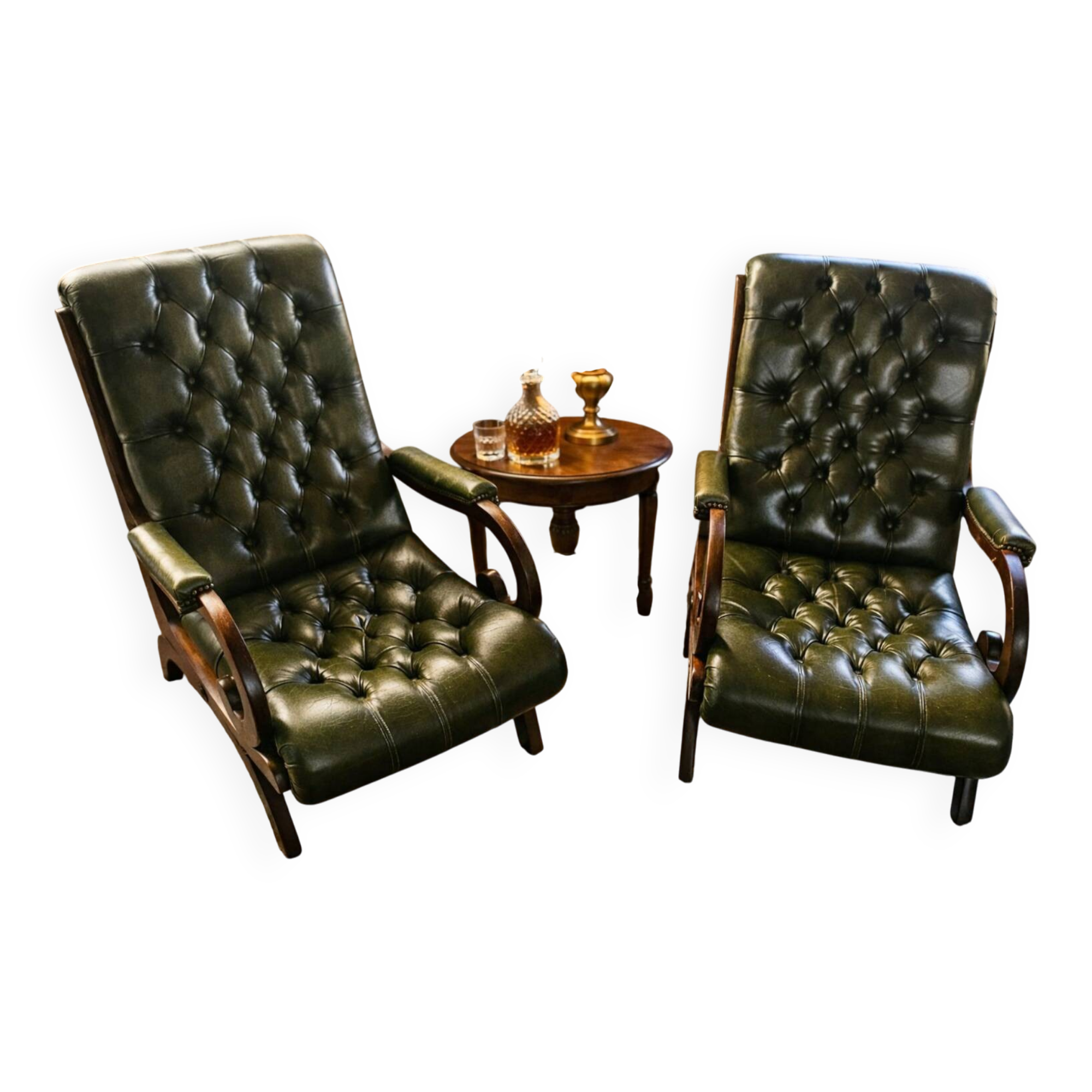 Pair of tufted leather armchairs in Chesterfield / English club style.
