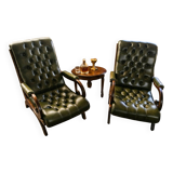 Pair of tufted leather armchairs in Chesterfield / English club style.
