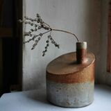 Vase in sandstone, free form, signed