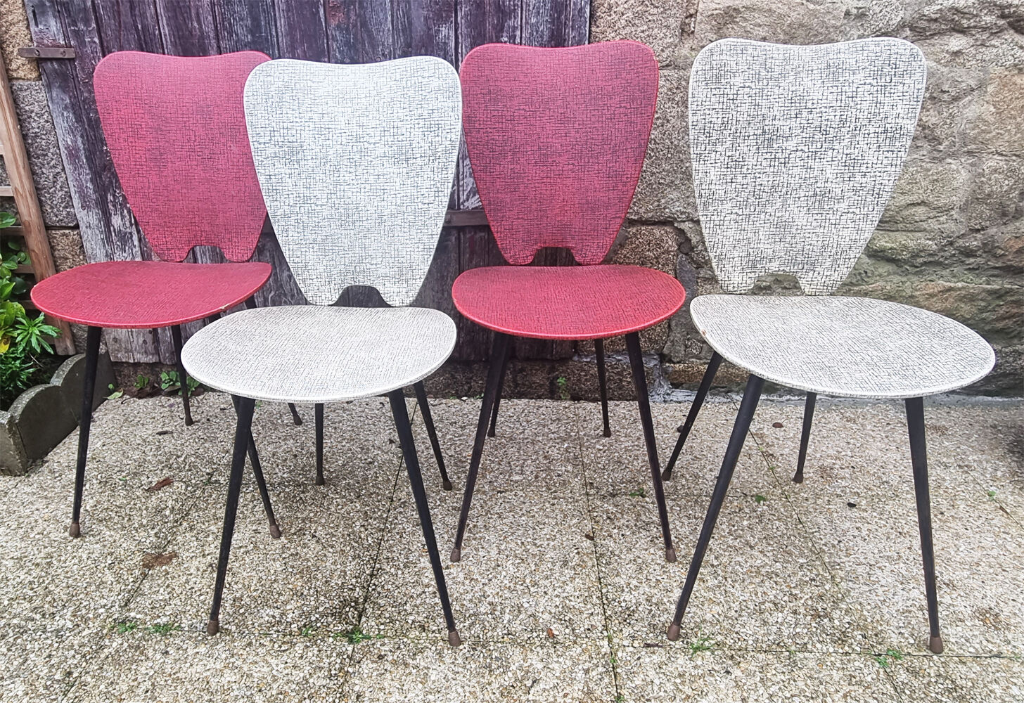 Four modernist chairs, steel, brass and skaï, 60s