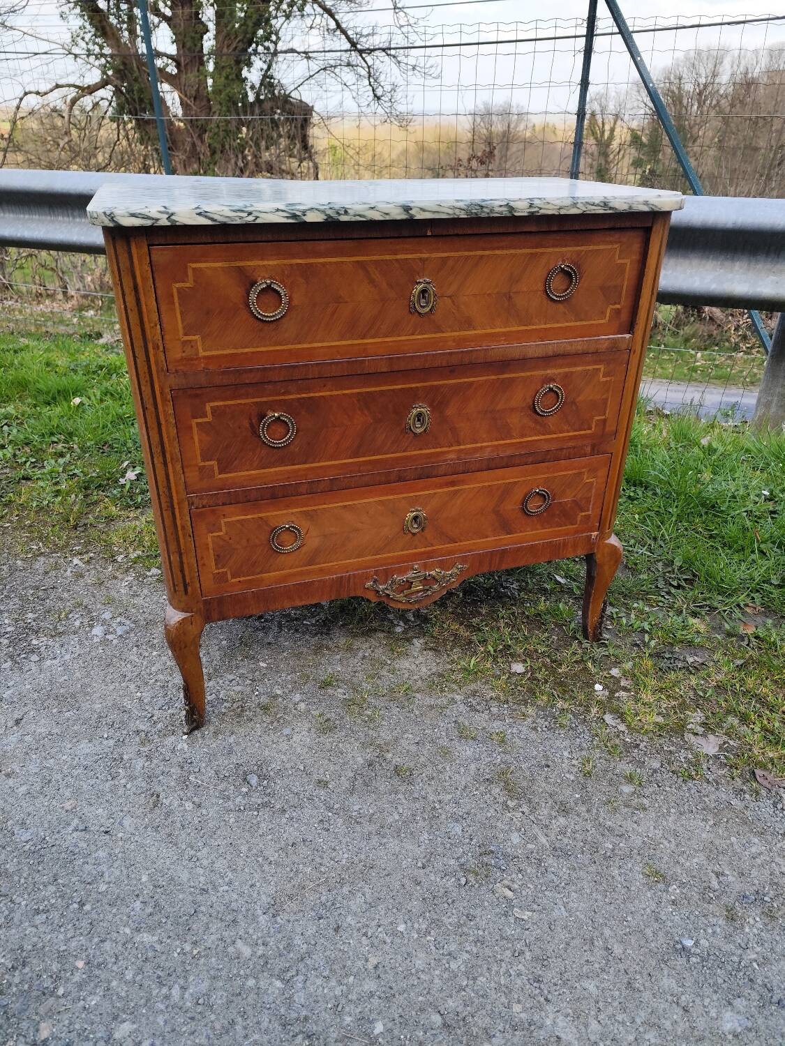 Louis XV, Louis XVI transitional style chest of drawers in marble and wood marquetry