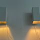Pair of minimalist white metal wall lights from the mid-century, 1960, Germany.