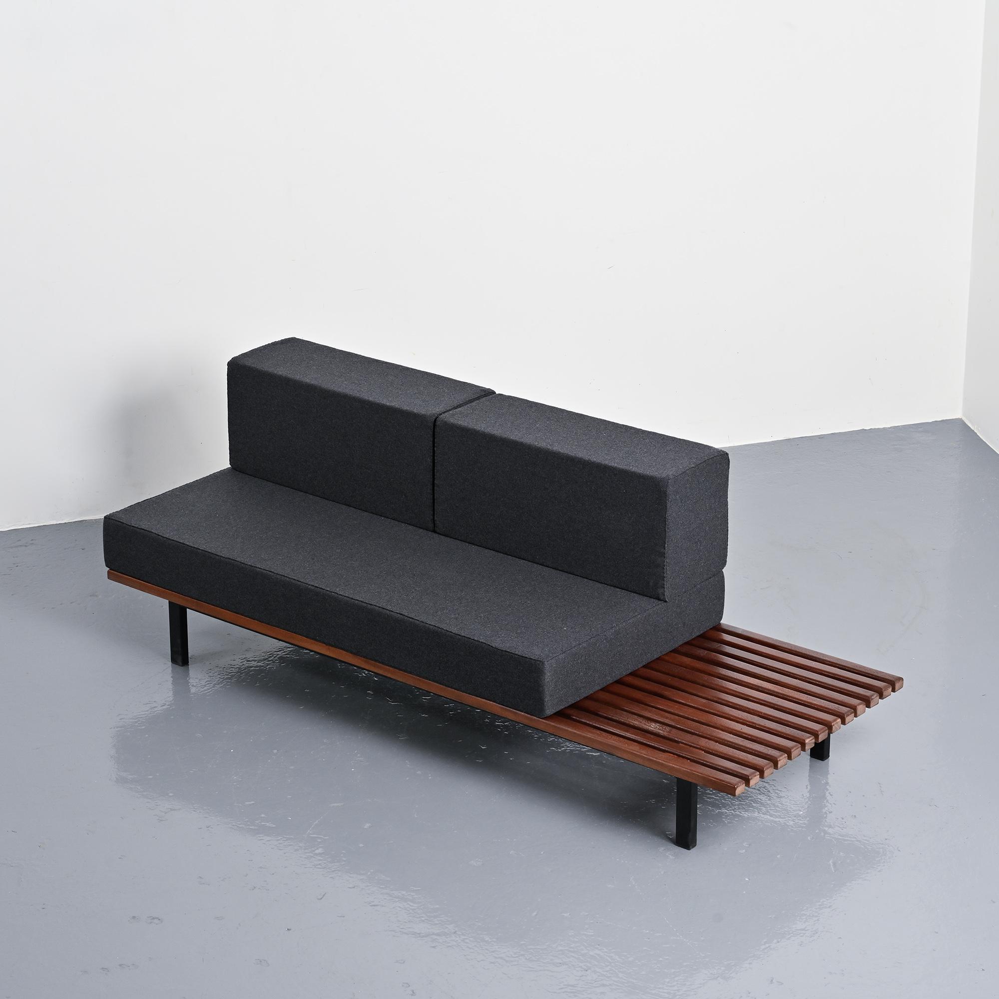 Cansado bench in mahogany by Charlotte Perriand, circa 1962.