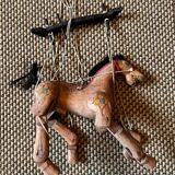 Wooden puppet horse