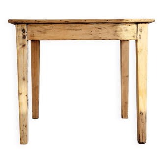 Antique farmhouse table in raw wood
