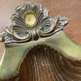 Empty shell pocket in vintage brass