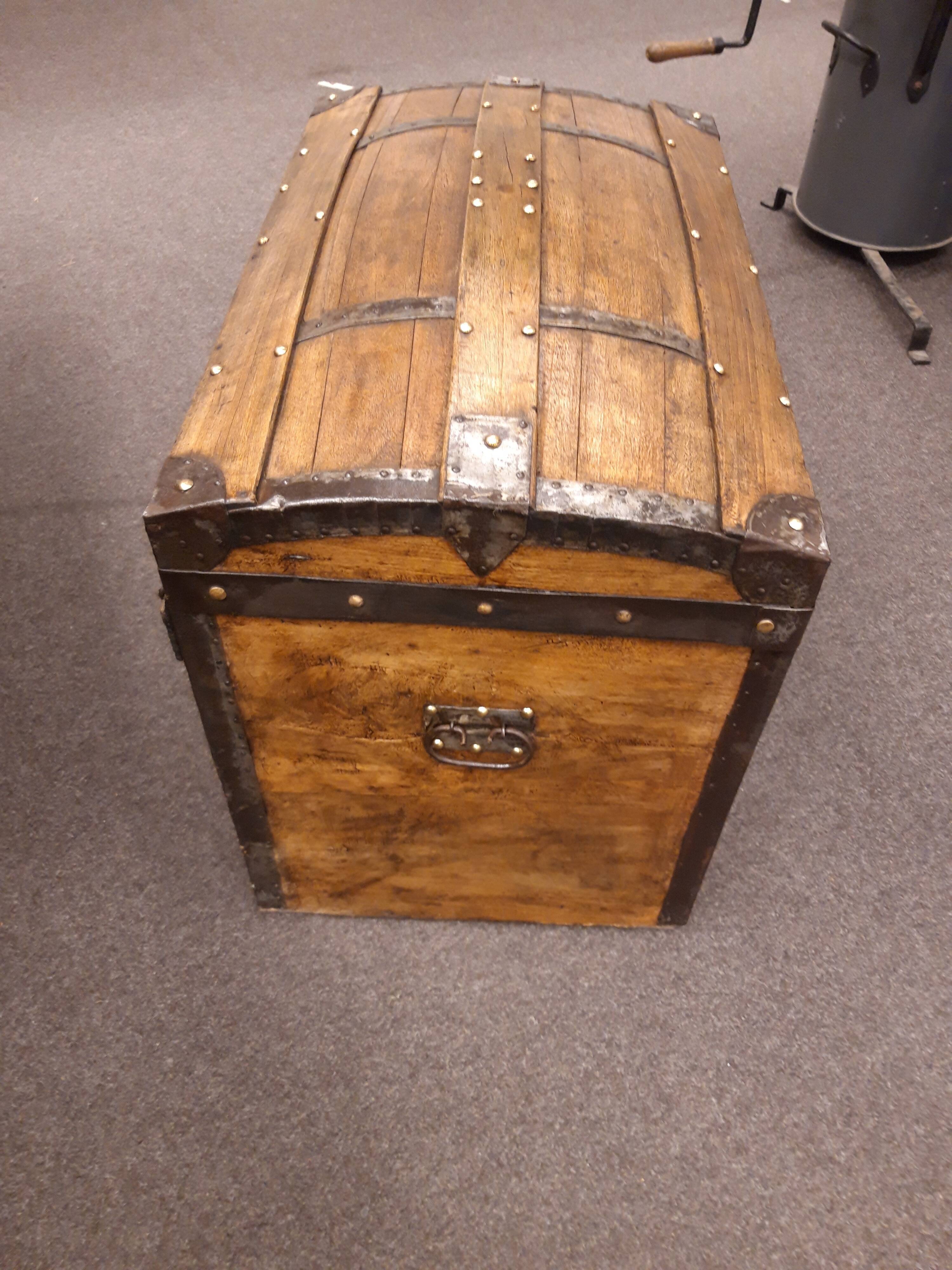 Wooden bulging trunk restored