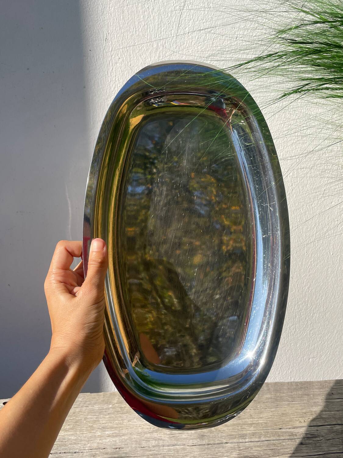 Oval stainless steel dish signed Rémi Letang