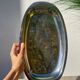 Oval stainless steel dish signed Rémi Letang