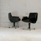 Pair of swivel armchairs, imitation leather and steel, Italy, circa 1960.