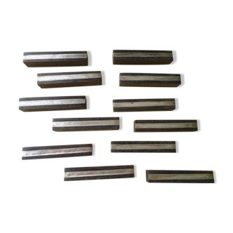 Set of 12 wooden and metal art deco style knife carriers