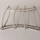 Silver metal modernist table mat