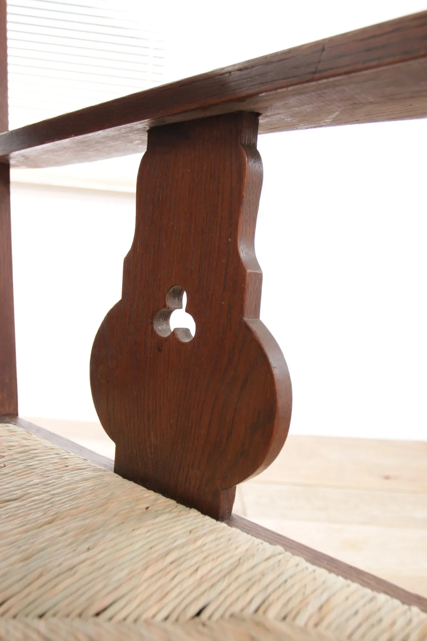 Pair of low Brutalist oak lounge chairs with new rush seats – circa 1935