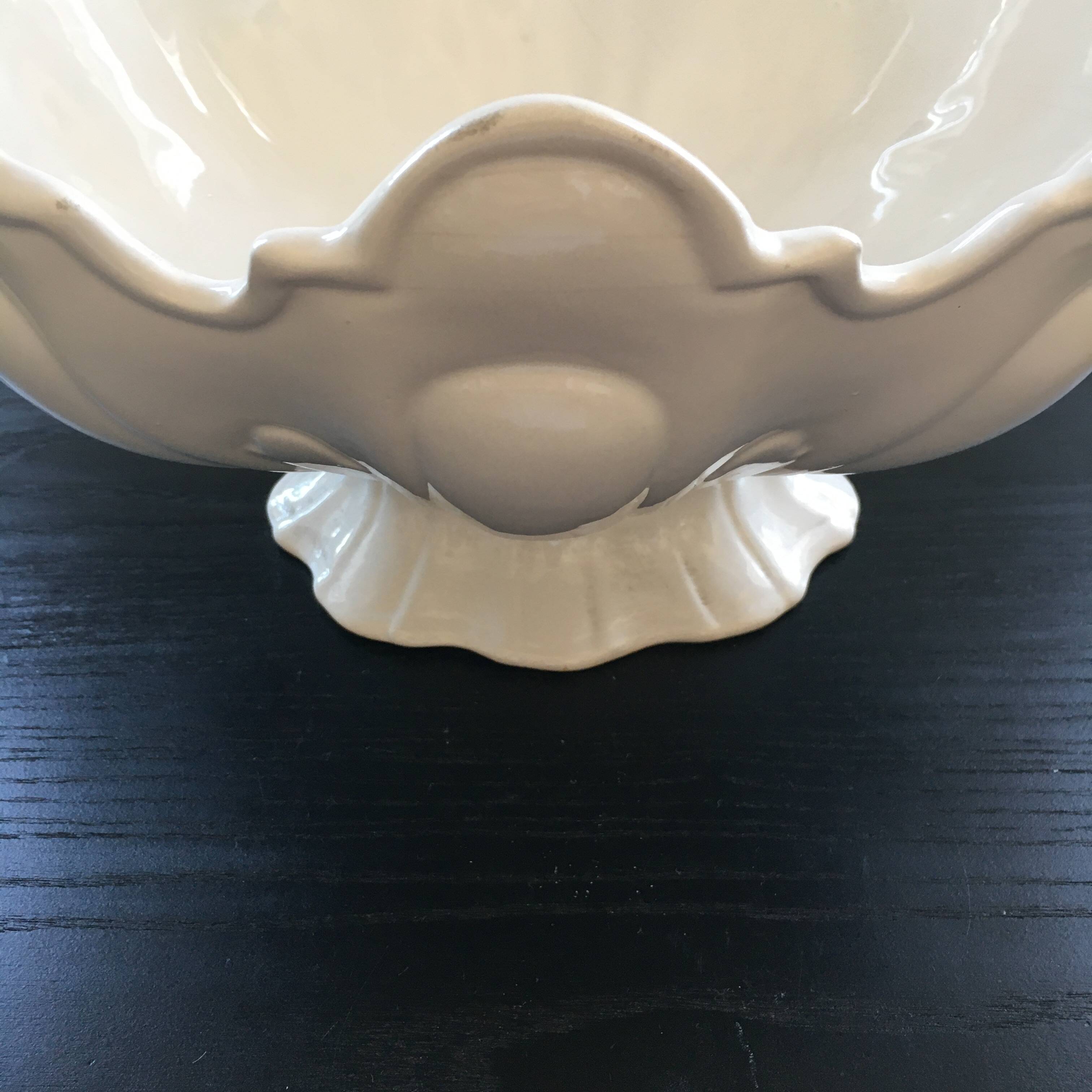 Large white scalloped cup