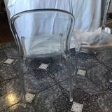 2 transparent plexiglass chairs