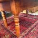 Oval drop-leaf coffee table