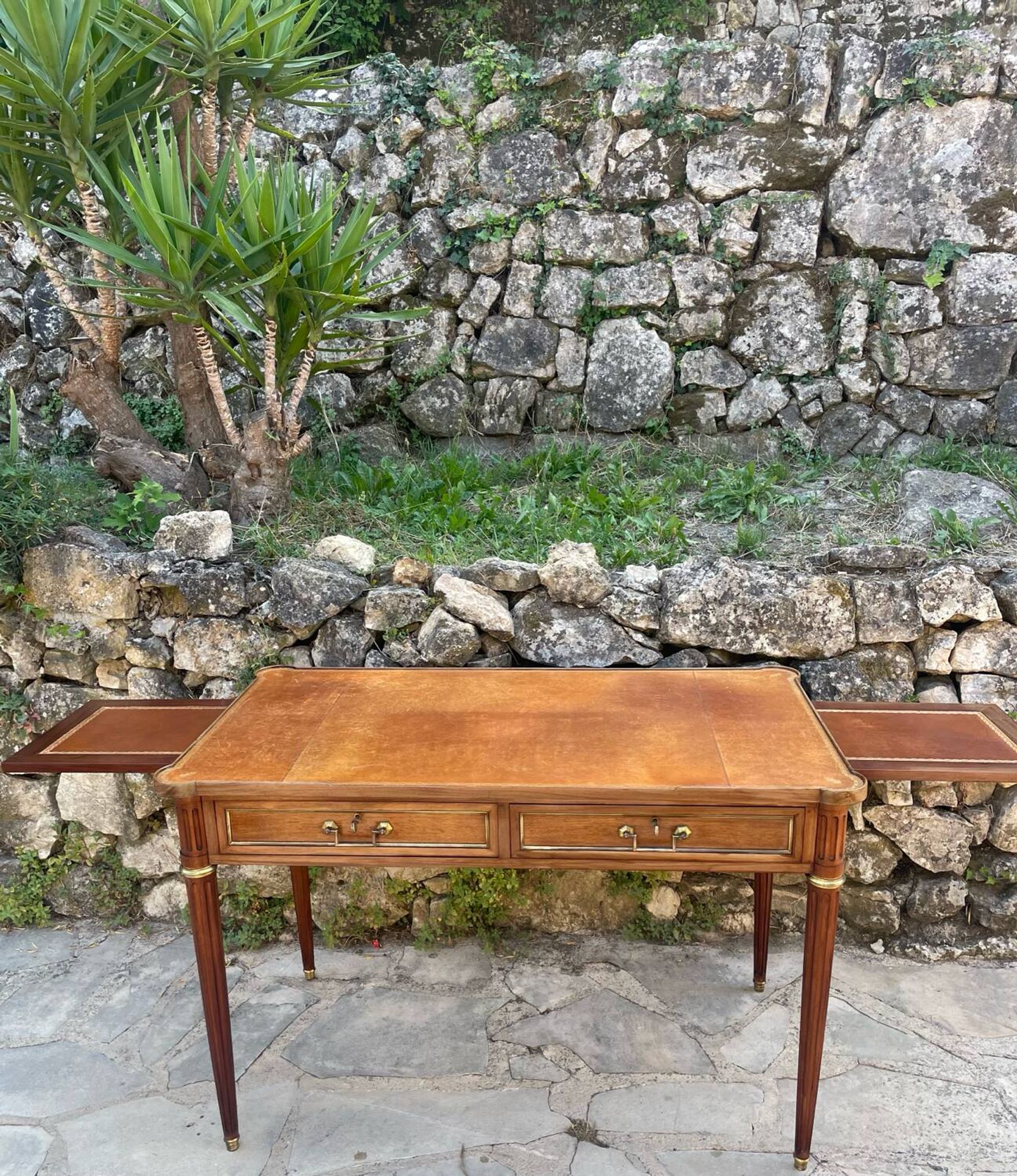 Louis XVI style mahogany flat desk from the late 19th century