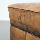Sturdy square vintage sheepskin pouf/ottoman with beautiful colours