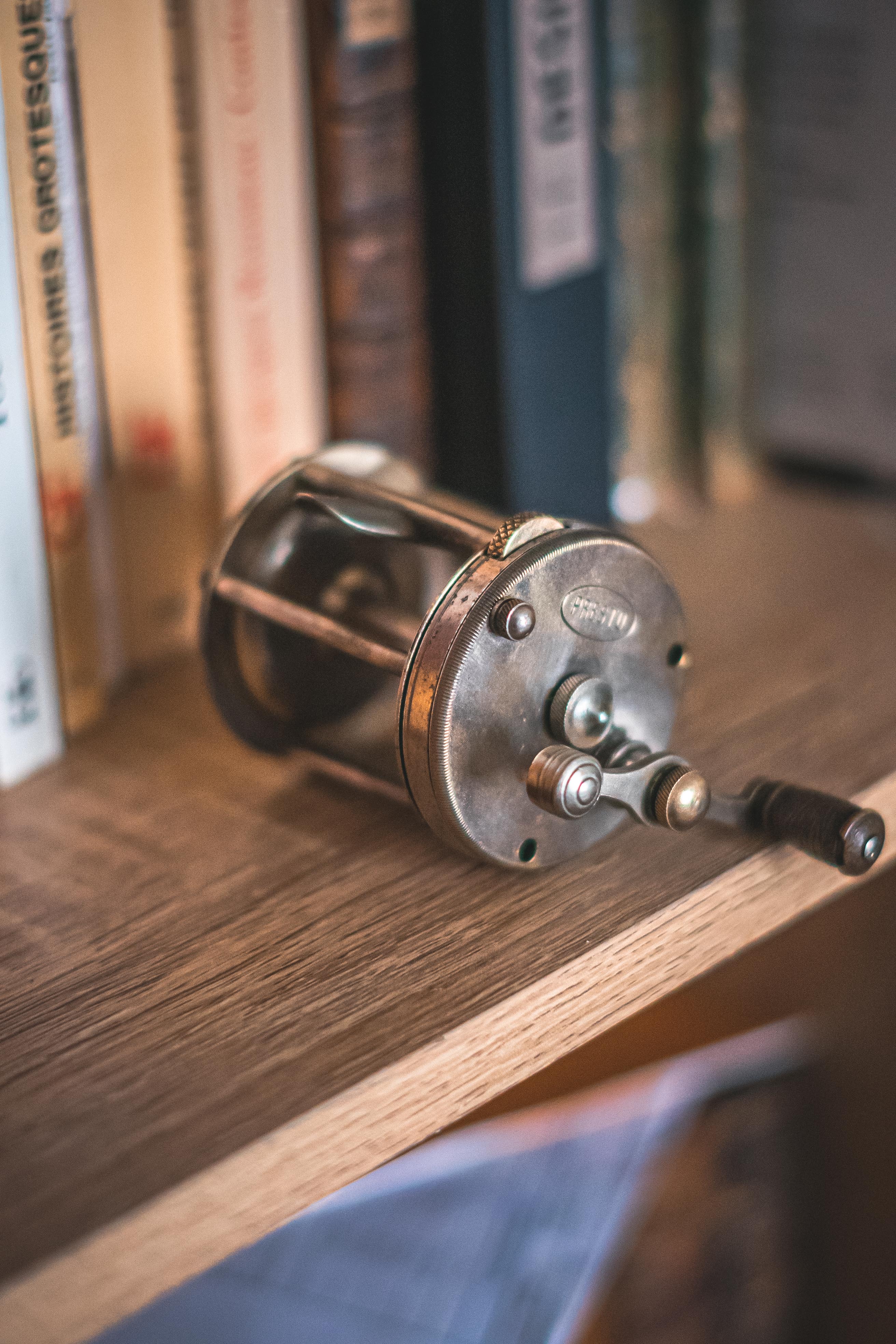 Old little fishing rod reel presto with bone handle fisherman collection