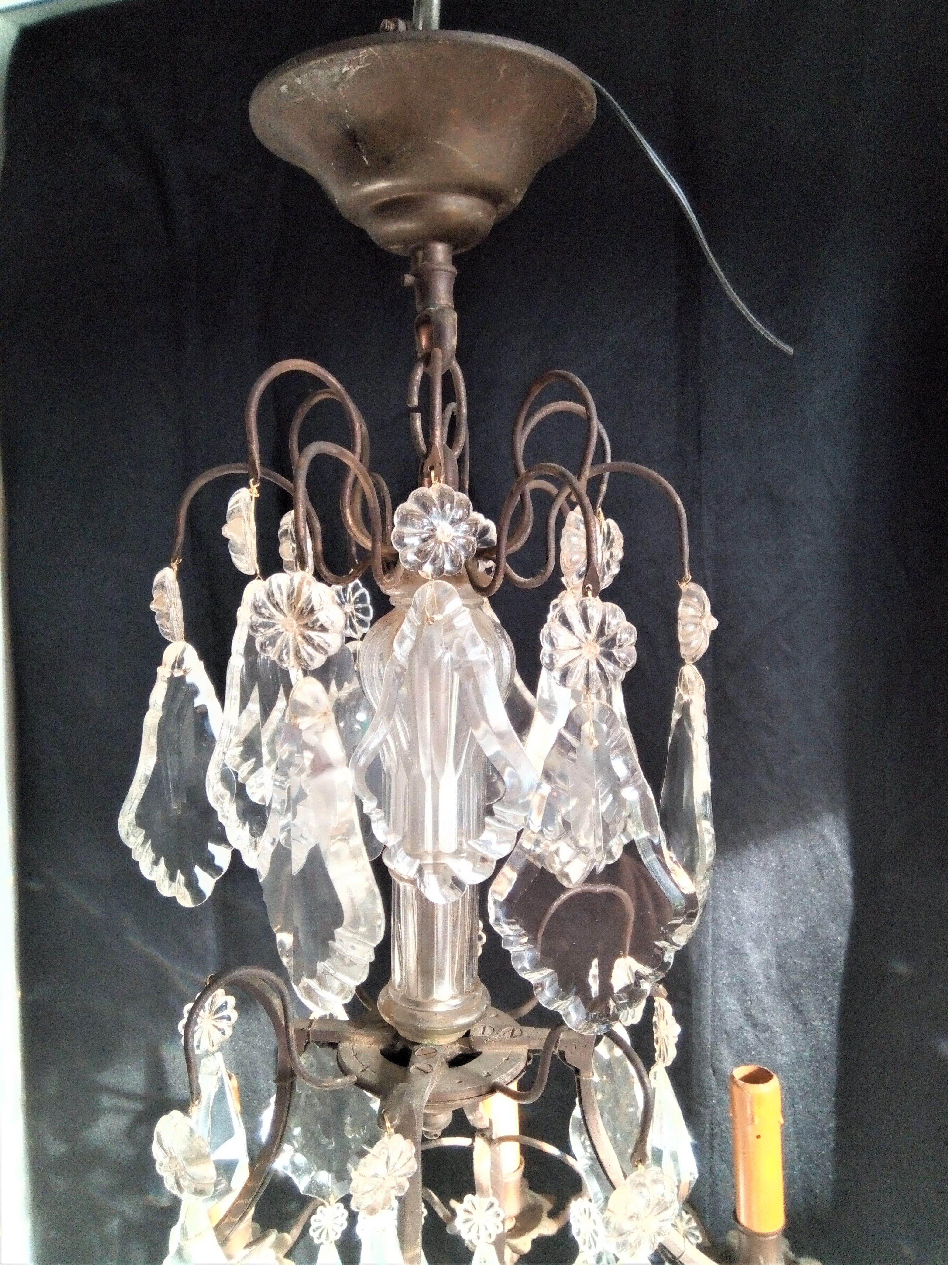 Old chandelier with tassels, bronze and crystal, 8 lights. Louis XV style.