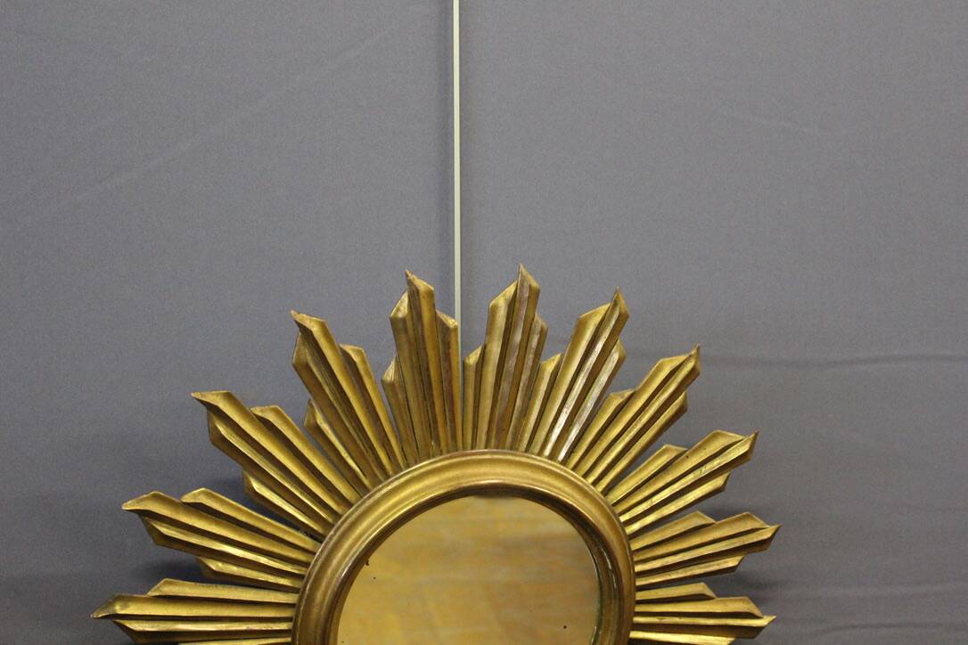 Sun mirror in gilded wood circa 1970