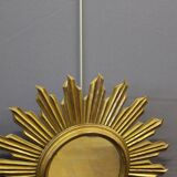 Sun mirror in gilded wood circa 1970