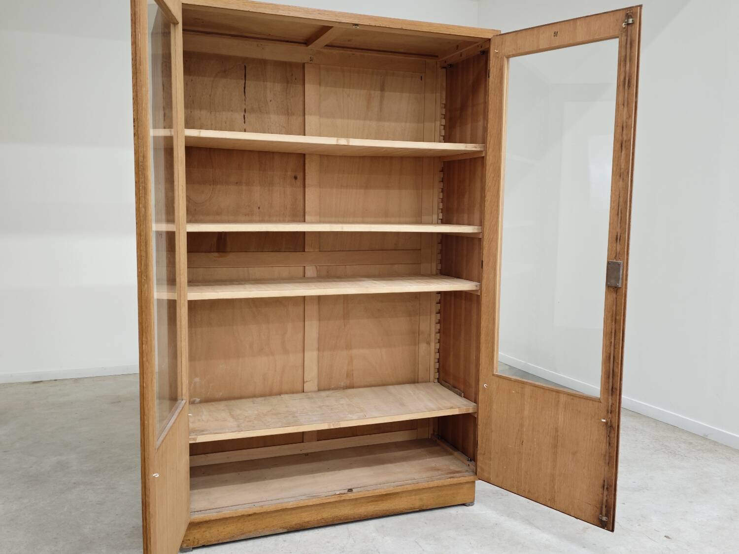 Oak glass-fronted school cabinet 1960