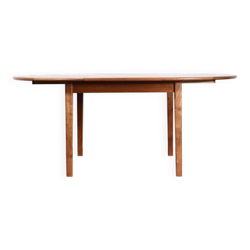 Table ronde extensible en teck danois des années 50.