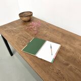 Solid oak dining table from the 70s with metal legs