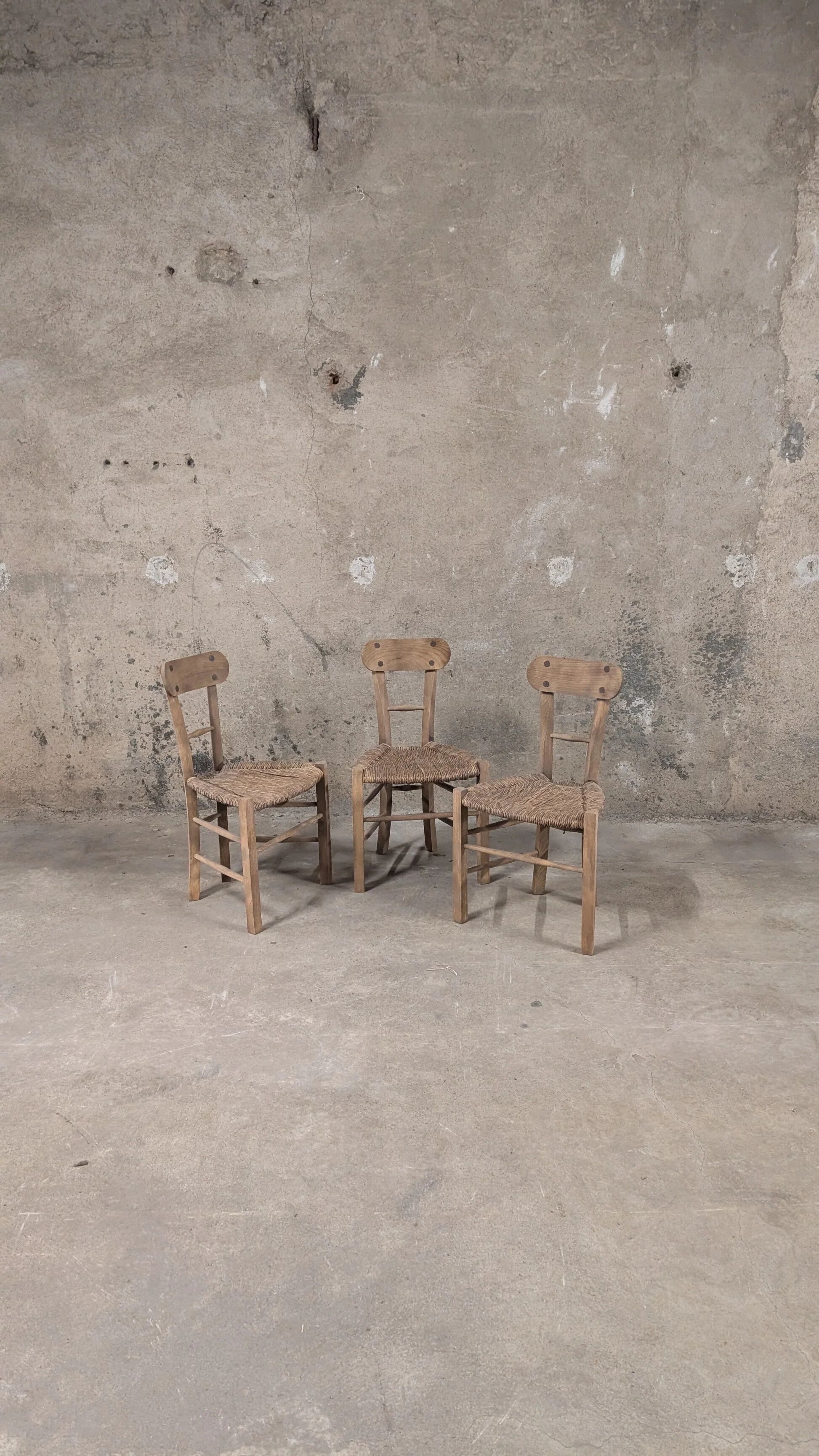 Set of 3 rustic wooden and woven straw chairs