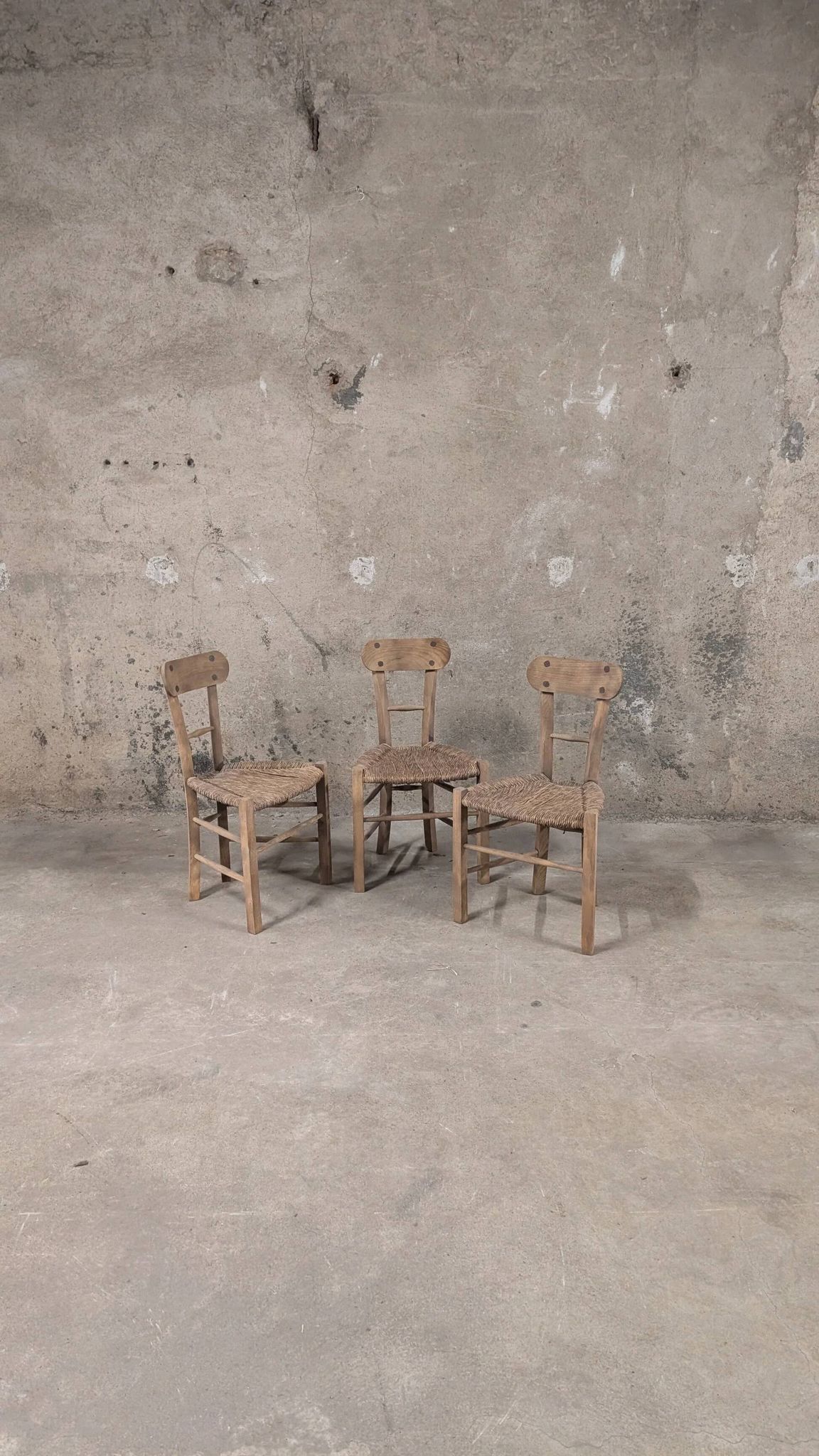 Set of 3 rustic wooden and woven straw chairs