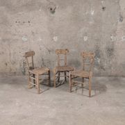 Set of 3 rustic wooden and woven straw chairs
