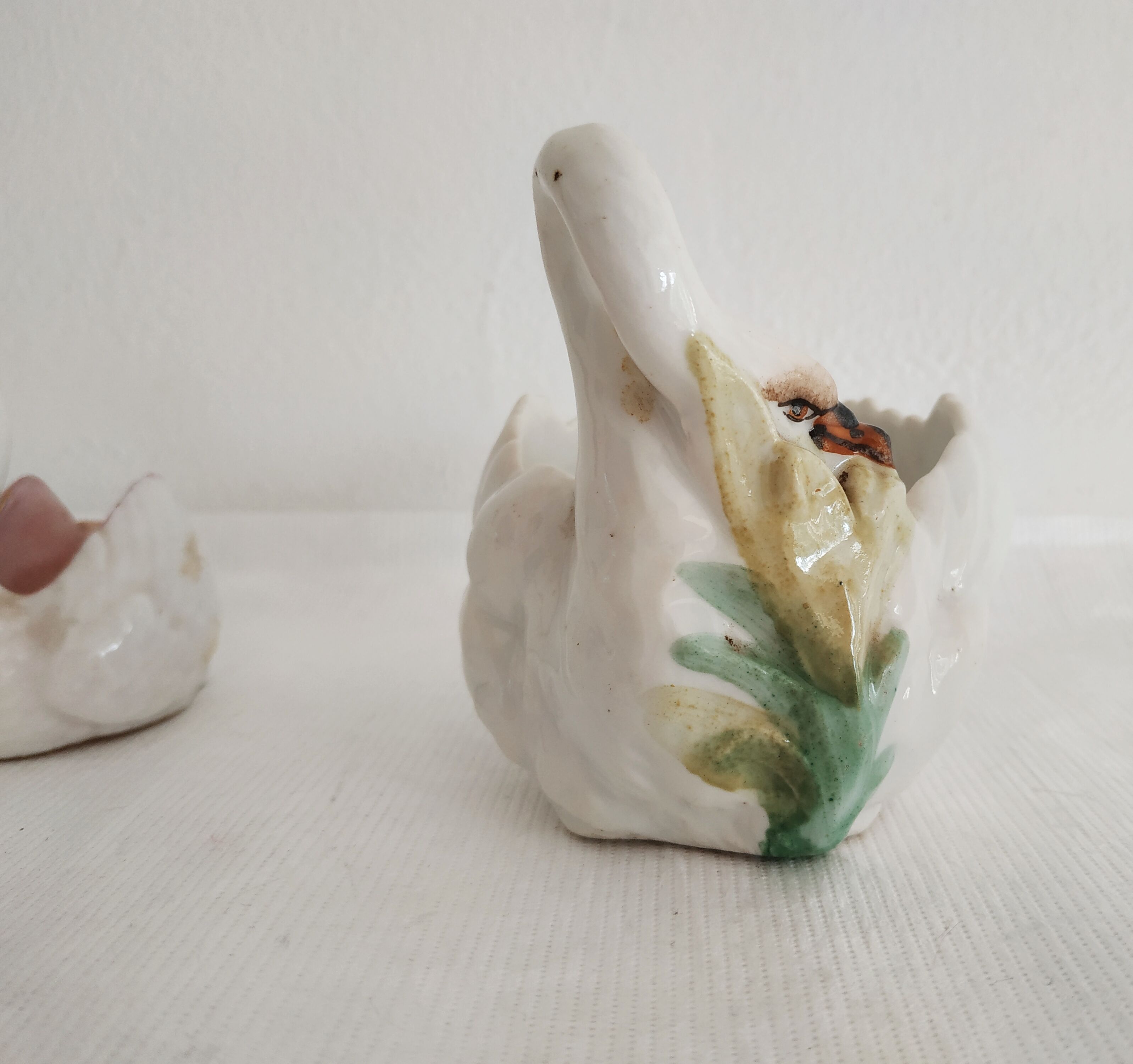 Mustard and salty swans, circa 1900