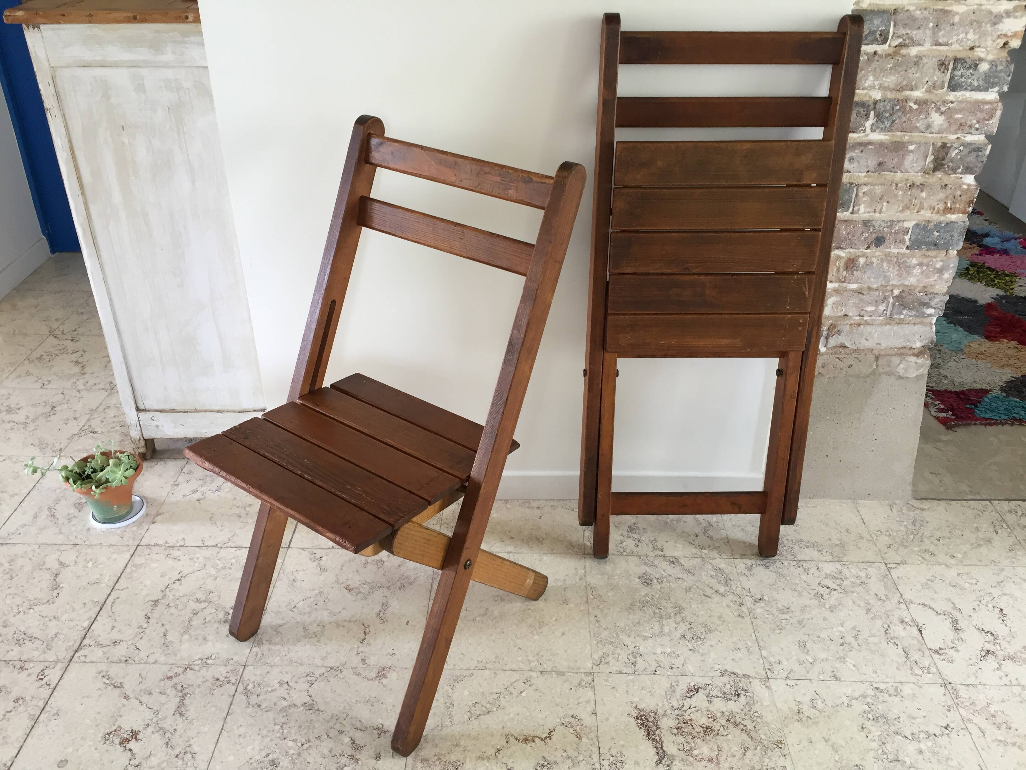 Folding chairs "by the wood fire"