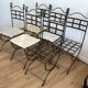 Six wrought iron chairs