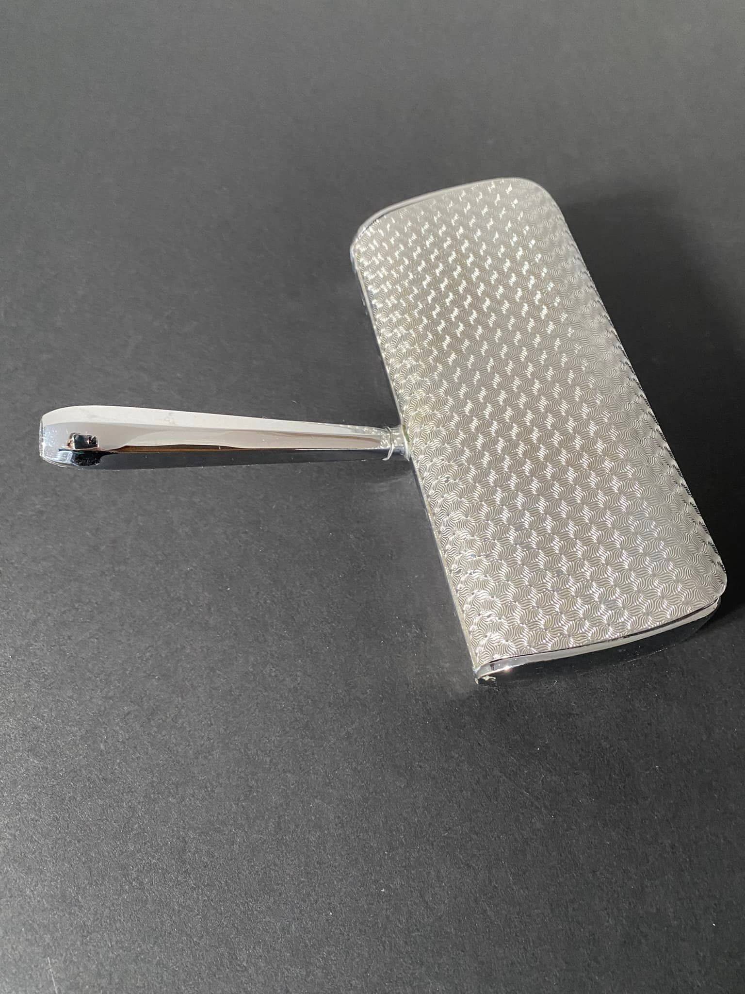 Vintage silver table crumb catcher with stainless steel handle