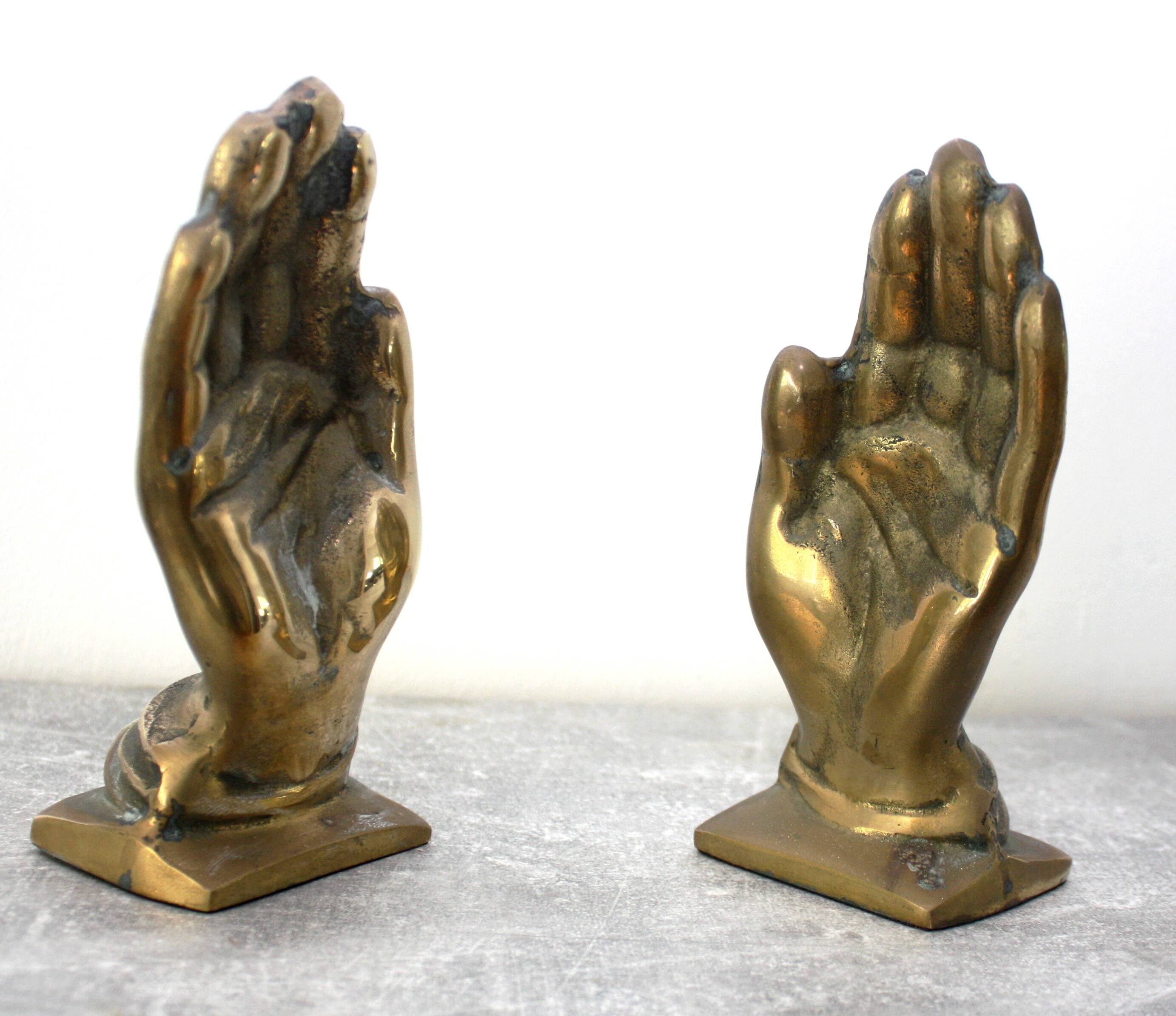 Serre livres mains en bronze