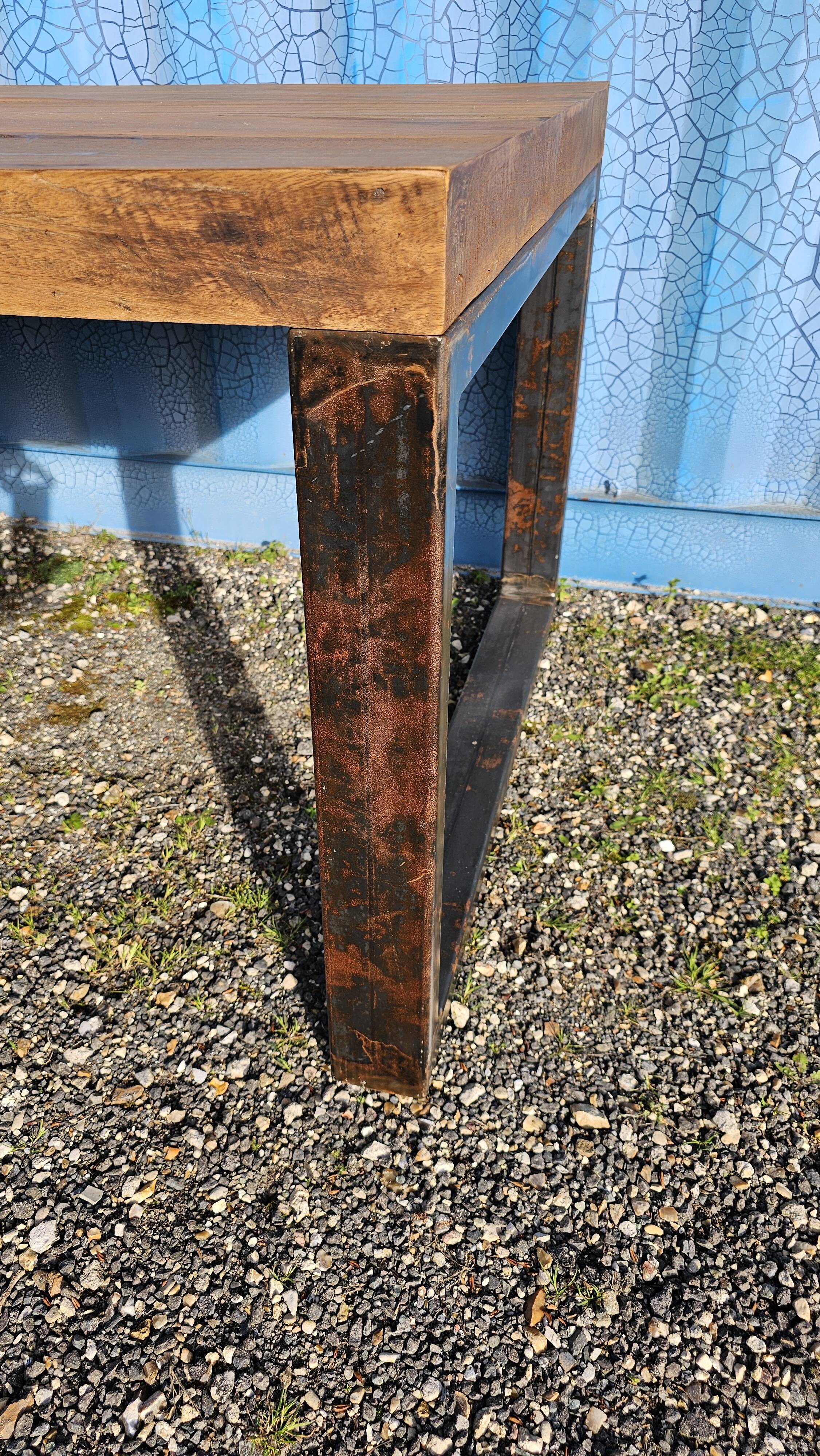 Industrial teak and metal table