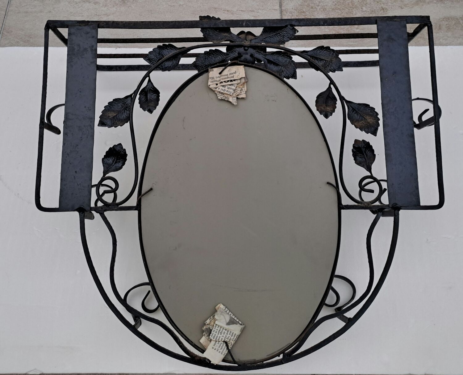 Wrought iron wall coat rack