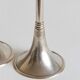Duo of silver-plated brass candlesticks, 1950s/1960s