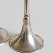Duo of silver-plated brass candlesticks, 1950s/1960s