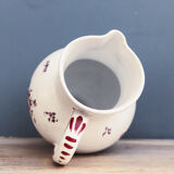 Old pitcher in earthenware, signed