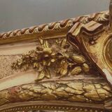 Louis XV style mirror in wood and gilded and patinated stucco 19th century