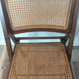 Folding chair caned from the 70s